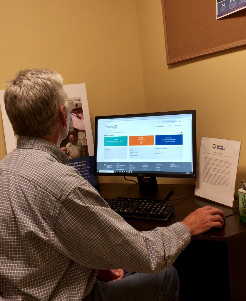 Wes Todd searches for grants for MCH, Inc. at UMC's office.