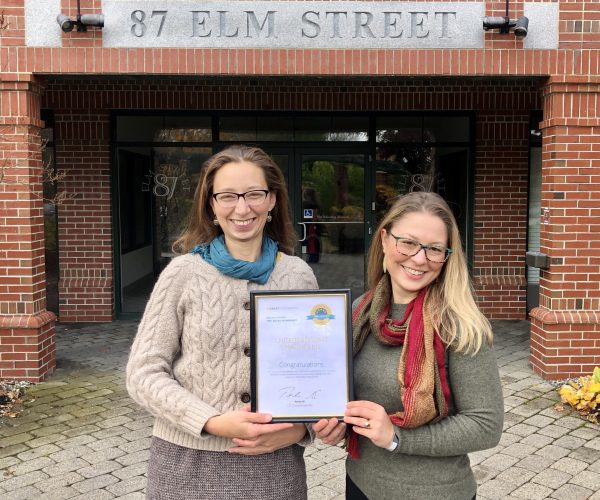UMC staff Megan Williams and Kelly Carey display the 2019 Top-Rated Award.